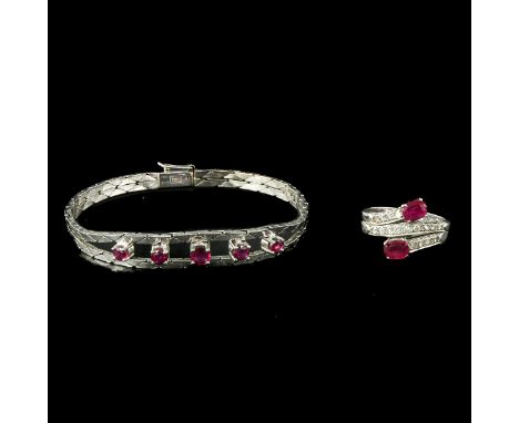 14k gold set with diamonds and rubies, ring size 18