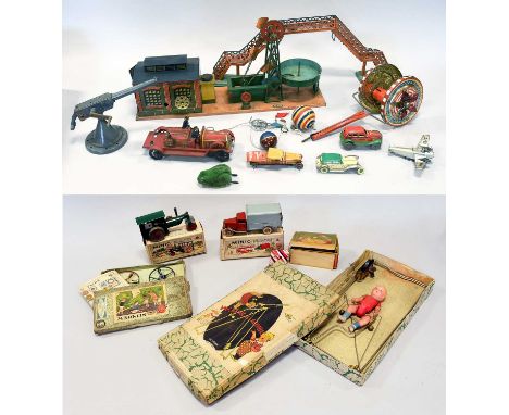 Various Tin Toys including German live steam accessory Engine Shed with water scoop and lift, Japanese Mechanical Acrobat, Ma