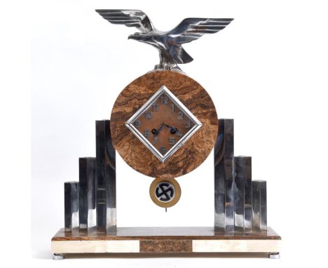 A EUROPEAN SOCIALIST ART DECO MANTEL CLOCK circa 1930s, possibly Belgian, the two train movement in a patinated drum case, th