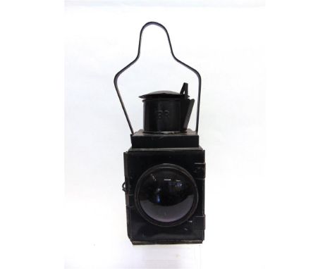 A BRITISH RAILWAYS 'BULLSEYE' TAIL LAMP black, with a convex red lens, complete with reflector, 'B.R.' burner, and sliding re