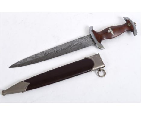 A GERMAN THIRD REICH MODEL 1933 SA DAGGER RZM M 7/2, the 22cm blade engraved 'Alles fur Deutschland', the crossguard without 