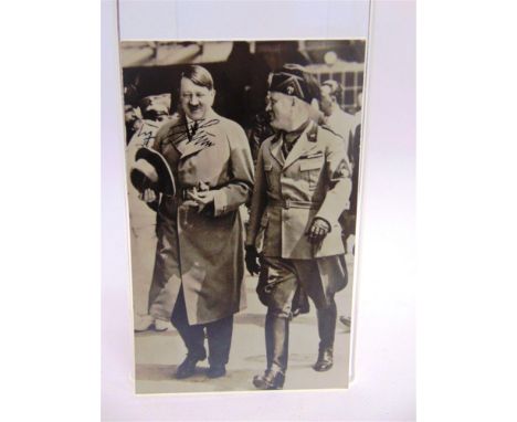 ADOLF HITLER (1889-1945) - A RARE SIGNED BLACK & WHITE PHOTOGRAPHIC PORTRAIT POSTCARD 'Hitler und Mussolini', the two smiling