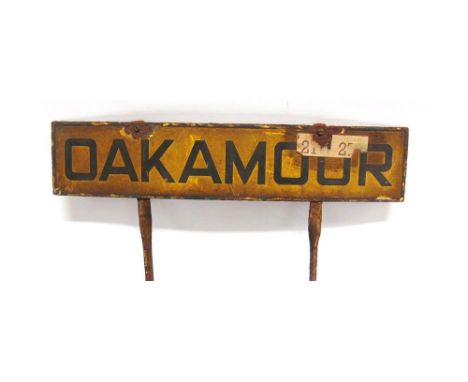 A LONDON, MIDLAND & SCOTTISH RAILWAY ENAMEL LAMP TABLET 'OAKAMOOR' with black lettering against a yellow ground, in original 