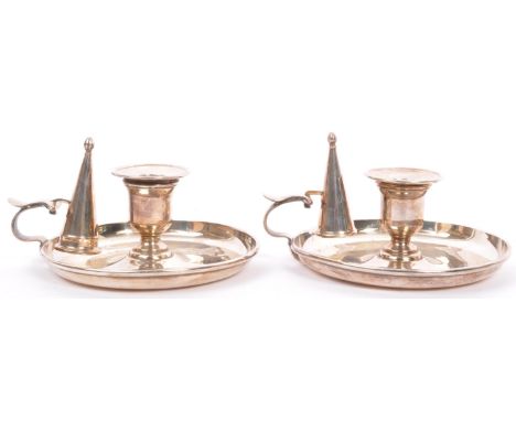 A pair of early 20th century George III style silver plated chambers candle holders / stick. Each&nbsp;with reeded borders, w