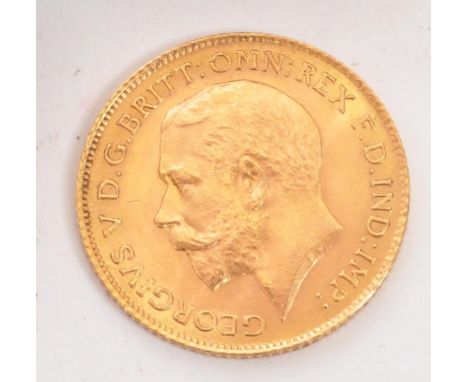 King George V, Half-Sovereign, Bare head l. R. St. George and dragon, London Mint, gold. With a white metal sprung coin holde