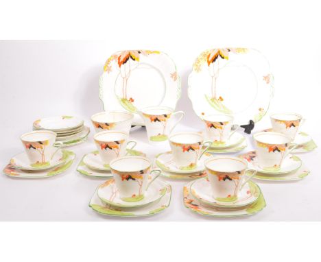 A vintage retro 20th century tea service ware / set by Victoria, Bone China, England. To include six cups, twelve saucers, su