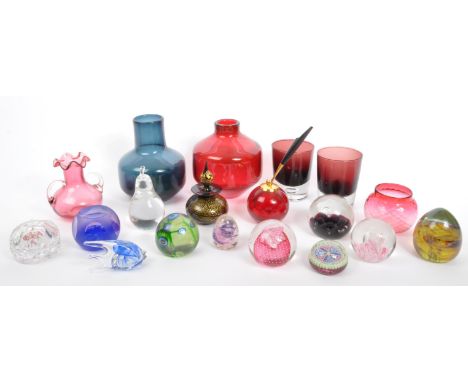 A collection of 20th century glass paperweights to include a paperweight in the manner of Lundberg Studios with acid etched m