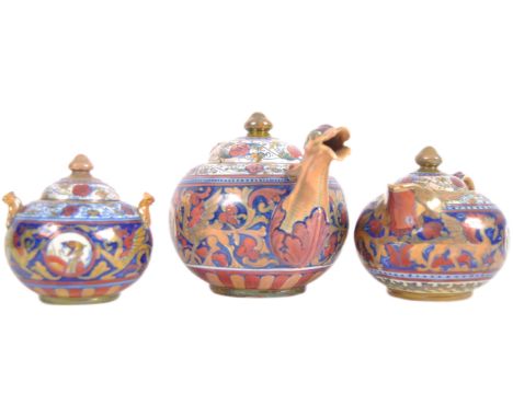 An early 20th Century Italian faience pottery three part tea service of large size. Hand painted decoration with glaze finish