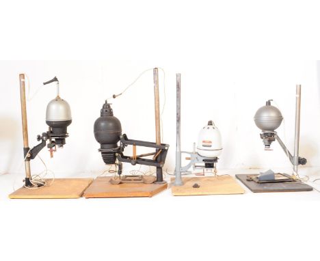 A collection of four 20th century photographic dark room enlargers to include the makers Gnome Cadet, Photax Wimborn and Glob