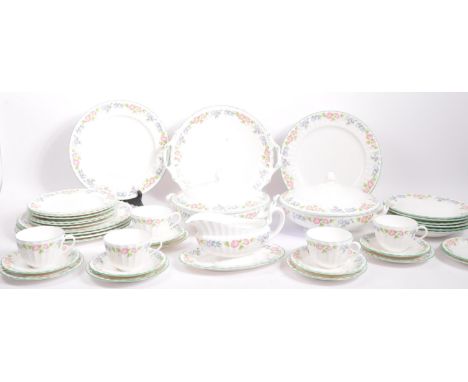 A Royal Worcester bone china porcelain tea / dinner service. In the English Garden pattern, to include, cups, saucers, dinner