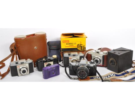 A collection vintage 20th Century camera equipment. To include; An Olympus OM10 with 500mm lens,&nbsp; Maw of London 'Nustyle