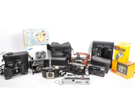 A collection of vintage 20th century cameras. The lot to include a Samsung WB100, Vivitar Vivicam 4345, Kodak Brownie 44a &am