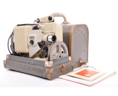 A vintage, retro mid 20th century Eumig P8 Novo automatic film projector. In its original cased box with instructions.&nbsp;