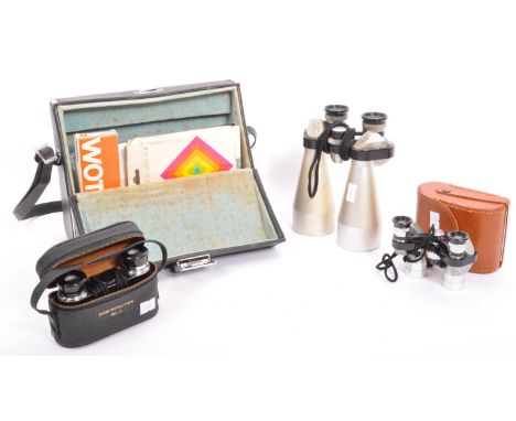 A Kodak SX-70 SX70 Land camera (polaroid) with its instructions, film and flashbar in original case. Along with an assortment