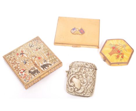 A collection of 19th century and vintage ladies compacts to include a Houbigant example of octagonal form with wood veneer to