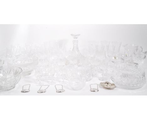 A collection of crystal glassware. To include, acid etched fruit bowl, serving bowl, stemmed drinking glasses, water jug, sma