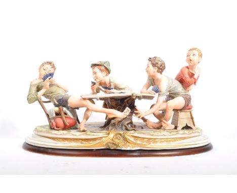 Capodimonte - The Cheaters - A large 20th century Italian Capodimonte porcelain group figure entitled 'The Cheaters' to depic