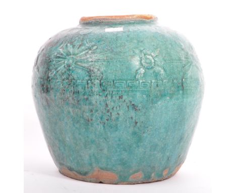 A large 20th century Chinese Oriental ceramic pottery ginger jar. The ginger jar's decorated with raised floral and abstract 