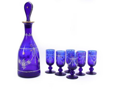 19th century style blue glass decanter and six drinking glasses, the decanter of mallet form with lozenge shaped stopper, all