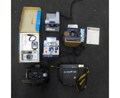 A box of Polaroid cameras 