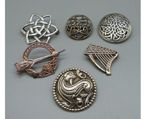 Six Celtic style silver brooches 