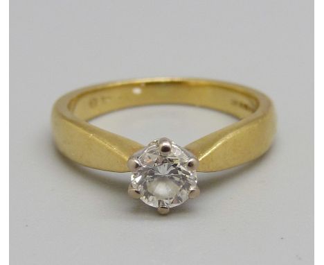 An 18ct gold, diamond solitaire ring, G colour, S1 clarity, 0.48 carat diamond weight marked on the shank, K, with certificat