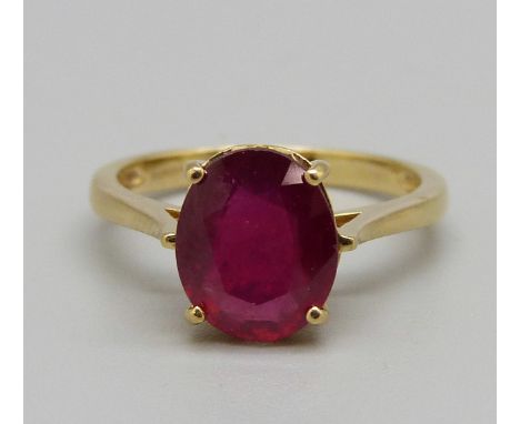 A 9ct gold and ruby solitaire ring, 3.4g, N 