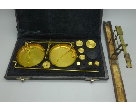 A set of jeweller's scales and one other set of 19th Century Wilkinson Guinea scales 