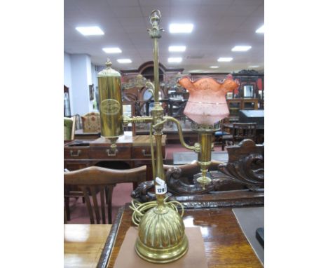 A XIX Century Style French Style Brass Oil Lamp, (converted) with a glass shade, gadrooned base (with brass label, Pairs, Ori