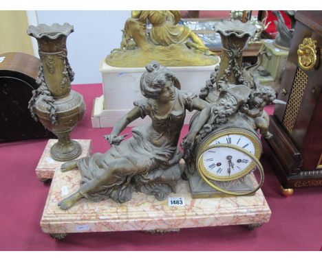 A Late XIX Centuy French Clock Garniture, the clock with speltre maiden and cherub holding a basket of flowers, the circular 