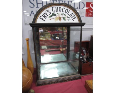 A Late XIX Century Fry's Chocolate Shop Display Cabinet, of rectangular form with two glass shelves, the enamel semi-circular