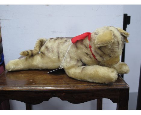 A Mid XX Century Steiff Sleeping Fur Cat, (button in ear), its back legs apart.
