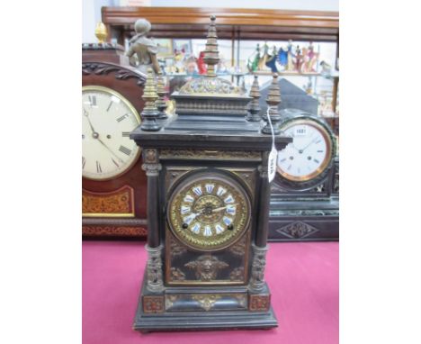 A Late XIX Century Continental Bracket Clock, of Gothic design, the ebonised case applied with cast metal mounts, the brass d