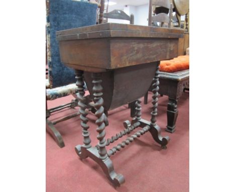 A Mid XIX Century Walnut Games/Sewing Table, with a fold over top, with chess,crib and backgammon boards, single drawer taper