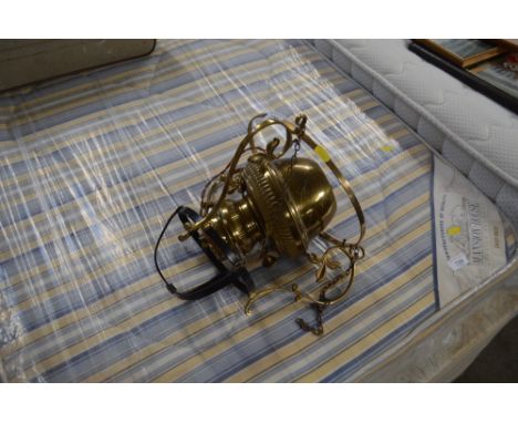 A hanging oil lamp converted to electric