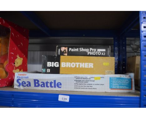 A Battleship game; a Big Brother game together with a Paint Shop Pro manual