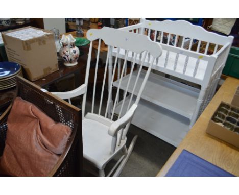 A white painted stick back rocking chair 