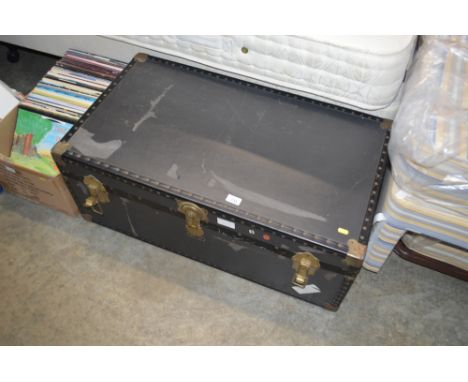 A metal bound travelling trunk