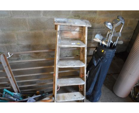 A small wooden step ladder