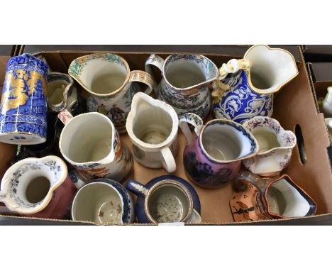 Fourteen 19th century and later ceramic jugs including Staffordshire, Copeland and Garrett, Adams blue and white jasperware w