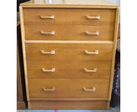 A pair of mid-century G Plan Brandon five drawer chests, light oak, 1950s, 78 cm wide x 45 cm deep x 98 cm high