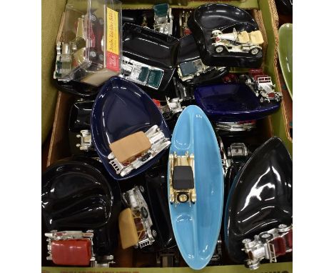 A large collection of Lesney and Matchbox classic car ashtrays, cigar boxes, pen rests, desk stands etc, some in original pac