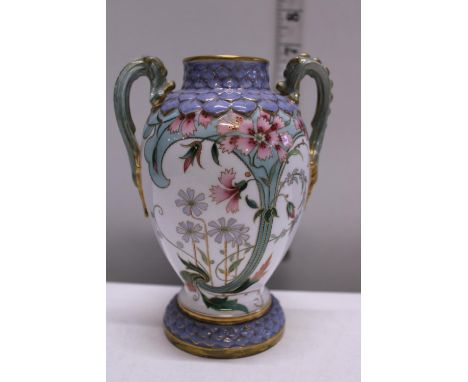 A hand decorated Royal Worcester two handled urn h15cm 