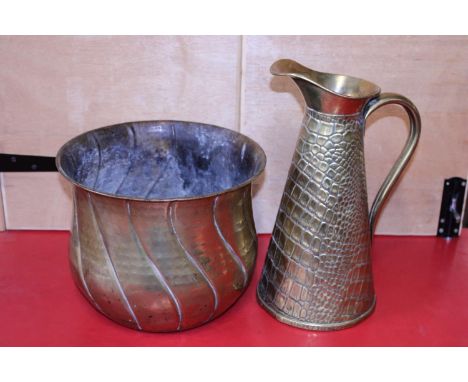 A early 20th century brass planter and jug 