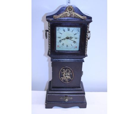 A wooden cased mantle clock converted for battery use 