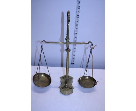 A set of vintage brass scales and weights 