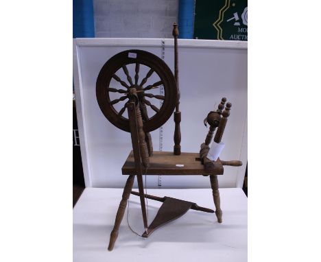 A vintage spinning wheel a/f, shipping unavailable 