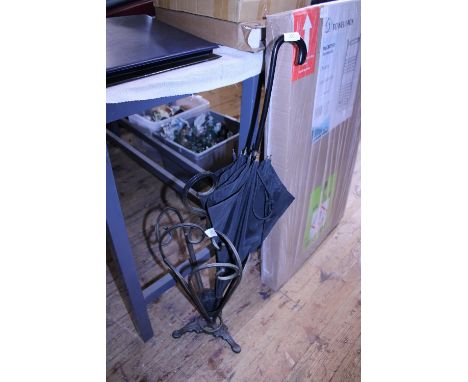 A vintage metal umbrella stand, shipping unavailable 