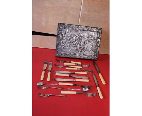 A vintage metal biscuit tin and contents of flatware 