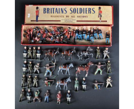 A collection of original vintage Britain's made lead toy soldiers. Examples to include British Guardsman, US Marines, WWII Se